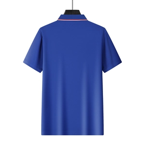 Back view of blue golf polo shirt showing red and white striped ribbed collar detail