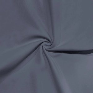 Detail of dark grey-blue textile fabric showing smooth texture and soft drape quality