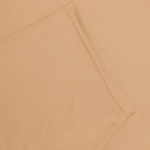 Detailed macro view of khaki knit fabric with precise double-needle stitching seams