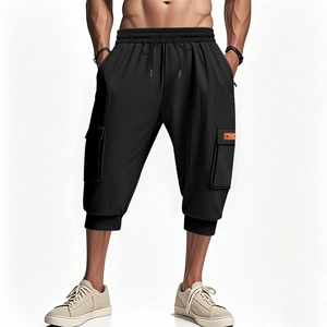 Men's black heavy cargo shorts with elastic drawstring waist and multi-pocket utility design