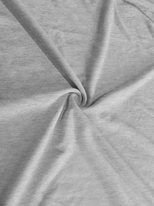 Close-up of heather grey knitted fabric texture showing elastic and soft material details