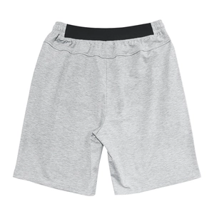 Flat lay detail of gray knit sports shorts with contrasting black elastic waistband