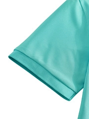 Detail view of the mint green ribbed cuff and breathable knit texture on the short sleeve polo