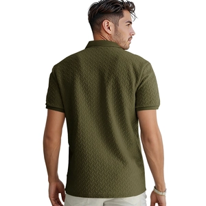 Close-up of olive green men's Polo shirt featuring textured jacquard knit and ribbed cuff