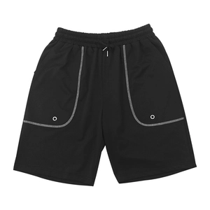 Detail view of black sports shorts featuring elastic drawstring waist and large pockets