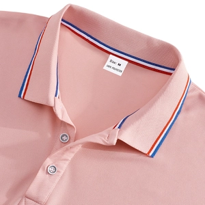 Close-up of pink quick-dry Polo shirt with tricolor neck tape and fabric texture