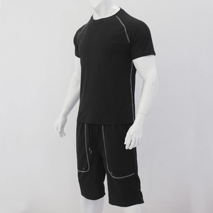 Detail of black sports set for men with white contrast stitching and drawstring waistband