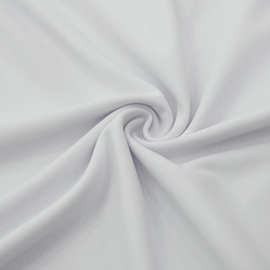Vue macro de la texture du tricot blanc et détails du matériau doux du polo