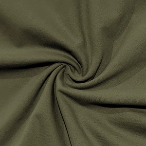 Close-up of deep olive green textile fabric with dense texture and premium drape effect