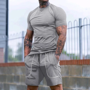 Men's breathable grey summer sports set with slim fit t-shirt and drawstring shorts