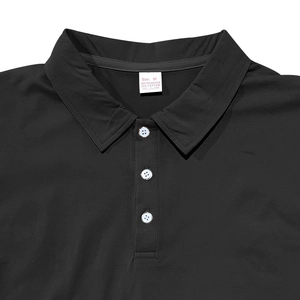 Detail of black polo shirt collar with three white buttons and size M fabric label