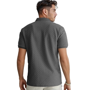 Macro shot of grey jacquard knit Polo shirt featuring premium herringbone texture
