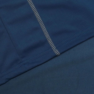 Close-up of quick-dry navy blue sportswear showing breathable mesh and flatlock seams
