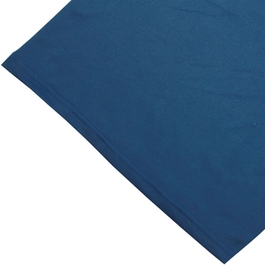 Detailed macro view of dark blue breathable fabric with professional double-needle stitching