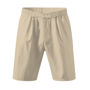 Close-up of beige linen shorts featuring an adjustable drawstring and elastic waistband