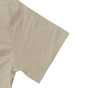 Detail of double-row stitching on short sleeves of khaki linen men beach shirt
