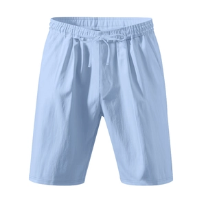 Detail of light blue linen shorts featuring a drawstring elastic waist and side pockets