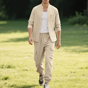 Men's casual linen two-piece set with a stand collar shirt and joggers in beige sand color