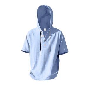 Close-up of light blue linen hooded shirt with four-button placket and black drawstrings