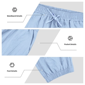 Detail view of men's linen pants showing drawstring waist, side pockets and elastic cuffs