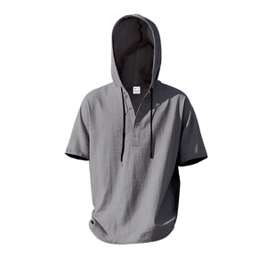 Detail view of men's linen hooded shirt with Henley collar and wooden buttons in grey