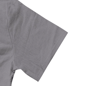 Detailed macro shot of grey linen short sleeve cuff with durable double stitching