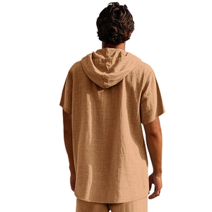 Rear view of a men's loose linen hooded beach shirt in tan with a casual drop shoulder