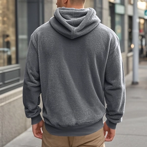 Rear view of a men's dark grey hooded sweatshirt showing polar fleece texture and loose fit