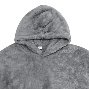 Detail of soft double-sided long-hair fleece fabric and drawstring hood on gray hoodie