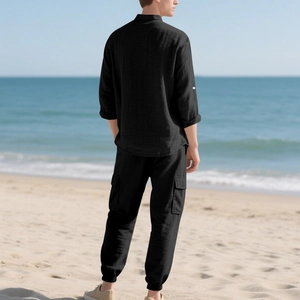 Men's black linen casual set featuring cargo pants with flap pockets and long sleeve shirt