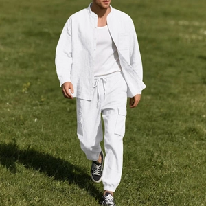 Men's white linen long-sleeve shirt and cargo jogger pants set in outdoor setting