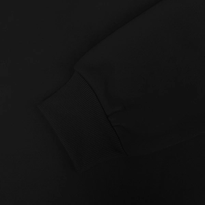 Detail of high-density knitted ribbed cuffs on men's thermal fleece hooded tracksuit