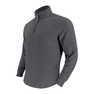 Detail of grey men's 1/4 zip waffle knit sweater showing collar and fabric texture