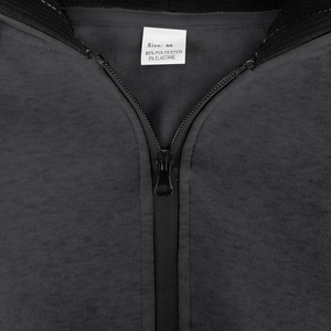 Detail view of M size label and water-resistant zipper on dark grey polyester hoodie