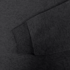 Detail of heather grey hoodie showing ribbed cuffs and soft fleece fabric texture