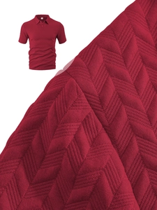 Detailed macro view of burgundy polo shirt with textured herringbone knit fabric