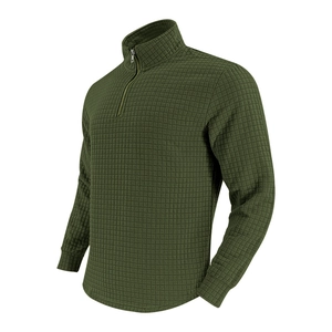 Close-up of military green waffle knit sweatshirt with quarter-zip stand collar and ribbed cuffs