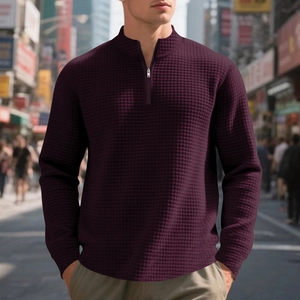 Detail of deep purple waffle knit sweatshirt with quarter-zip stand collar for men