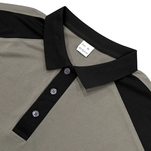 Détail du col polo bicolore avec trois boutons et texture en maille 100% polyester