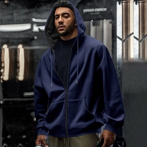 Men's navy blue zip-up hoodie featuring an adjustable drawstring hood and side pockets