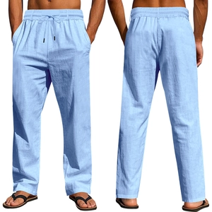 Detail of light blue linen trousers showing elastic drawstring waist and fabric texture