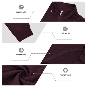Detail view of burgundy quilted sweatshirt showing zipper collar, ribbed cuffs and hem