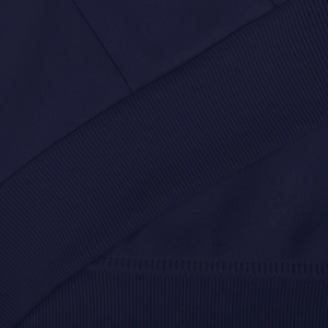 Detail of navy blue hoodie showing high-quality ribbed cuffs and smooth knit fabric texture