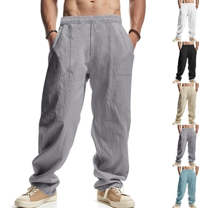 Men's loose linen trousers with elastic drawstring waist and breathable fabric texture
