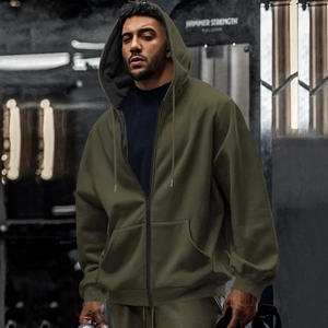 Detail view of olive green waterproof zip-up hoodie featuring ribbed cuffs and drawstrings