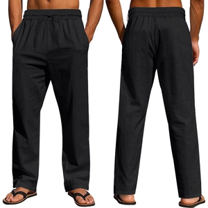 Detail view of black linen pants featuring drawstring waist and straight leg cut for men
