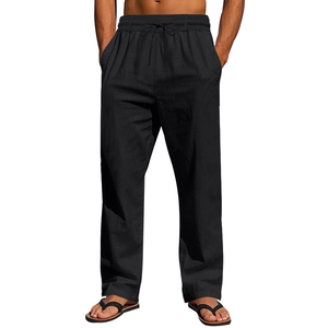 Detail of men's black linen trousers featuring an elastic waistband and adjustable drawstring