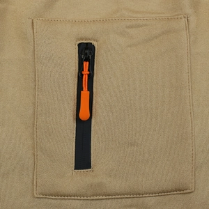Detail of khaki fleece hoodie featuring a waterproof black zipper pocket with orange puller