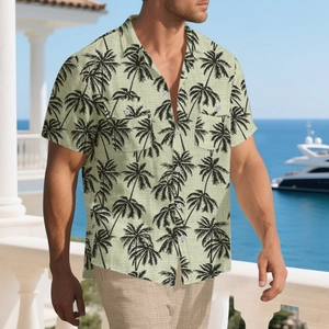 Detail of men's tropical coconut palm print shirt with dual chest pockets in a coastal setting