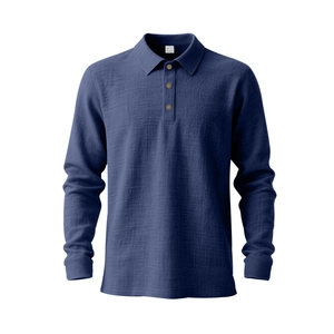 Detail of dark blue linen polo shirt featuring three wooden buttons and textured fabric